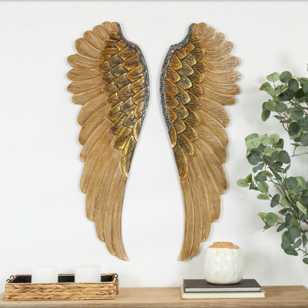 Escultura de pared alas doradas
